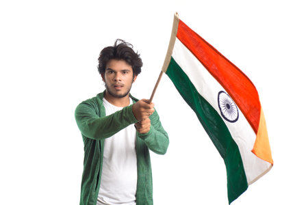 Young man with Indian flag or tricolor on white background, Indian Independence day, Indian Republic...