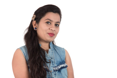 Portrait of beautiful young smiling girl on a white background