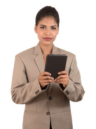 business woman using a mobile phone or smartphone isolated on a white backgroundの写真素材