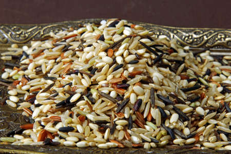 Wild rice on a metal tray, selective focus.の写真素材