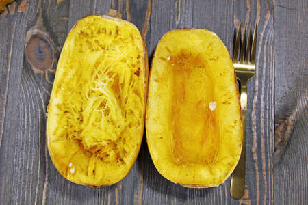 Overhead view of Spaghetti squash on a wooden backgroundの写真素材