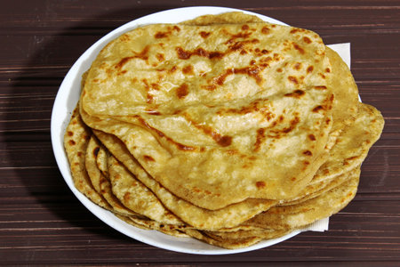 Whole wheat Paratha an Indian bead fried on a pan
