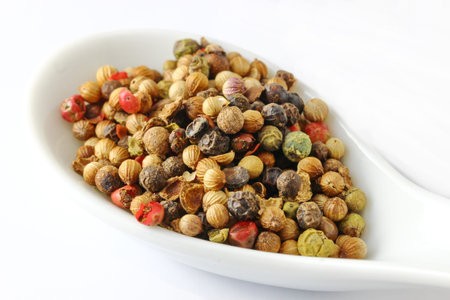 Black, red and green pepper seeds