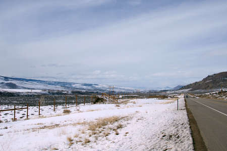 Highway road in winter season covered with snow.の写真素材