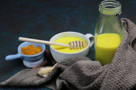Turmeric latte, golden milk or the anti-inflammatory Indian Haldi Doodh with superfood Turmeric...