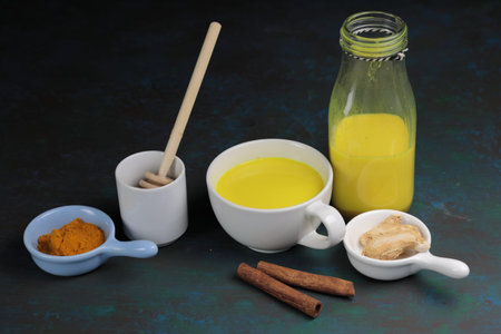 Turmeric latte, golden milk or the anti-inflammatory Indian Haldi Doodh with superfood Turmeric...