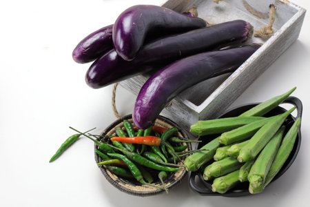 Indian vegetables of Tomatoes, carrots, Yams, Pointed gourd, Green chilies, 
Methi leaves,...