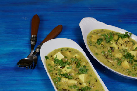Creamy Paneer or Tofu with green peas in a creamy gravy made of cream, chickpea flour and fenugreek...