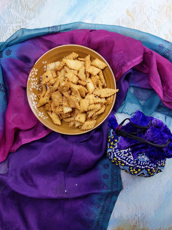 Namakpara (Khurma, Nimki, Mathri) which are  crispy, crunchy and savory strips in a bowl.