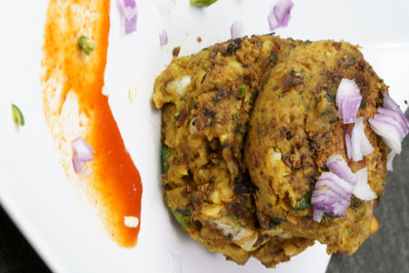 Spicy Black Gram or kala Chana tikki or Kabab on a plate.