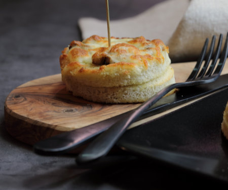 A platter of Cheesy Mushroom croustades or Cheesy Mushroom Discs toated for a starter or Hors d'oeuvreの写真素材