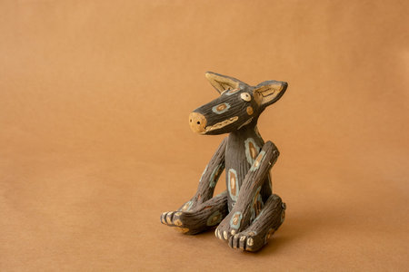 Figure made of clay and hand painted by a Mexican artisan. Prehispanic dog figurine with geometric figures.の写真素材