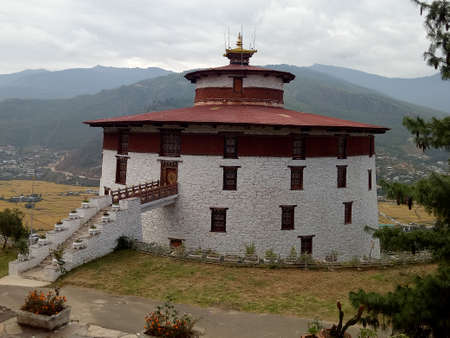 beautiful church with background hill and small treesの写真素材
