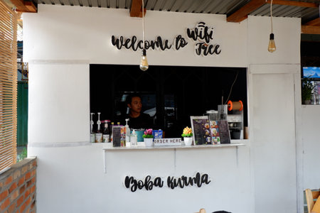 Grill 99 Barong Tongkok Kutai Barat, Indonesia - January 09, 2021: Cafe board with beautiful and modern decoration with lovely customers and free wifiのeditorial素材