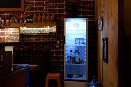 Barong Tongkok Kutai Barat, Indonesia - January 13, 2021: The interior of the coffee drinks stock in the cafe which has a modern interior at nightのeditorial素材