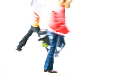 two young persons in blurry motionの写真素材