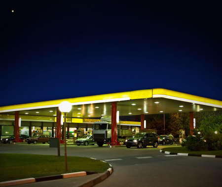 the gas station at night の写真素材