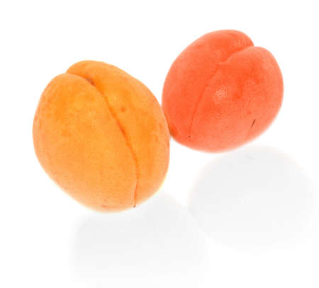 two apricots, isolated   の写真素材