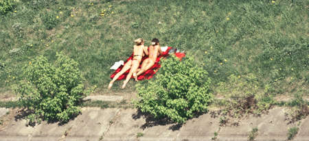 sunbathing girls の写真素材
