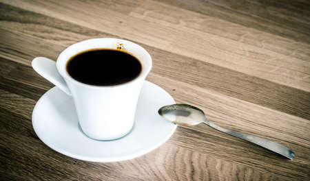 coffee cup on wooden tableの写真素材