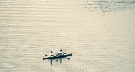 kayakers among big water