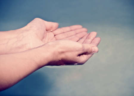 hands in waterの写真素材