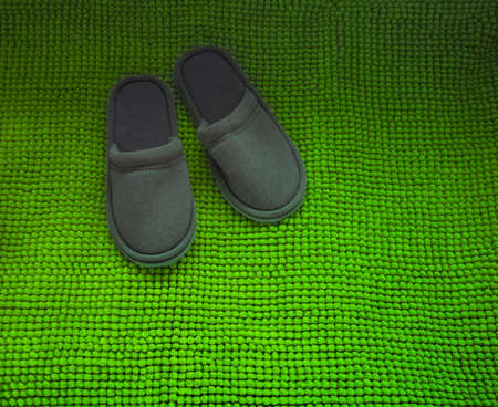home slippers on the rugの写真素材
