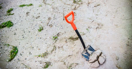 spade in ground (PS changes)の写真素材