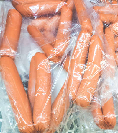 Packed sausages in a freezerの写真素材