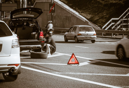 fitting wheel among trafficの写真素材