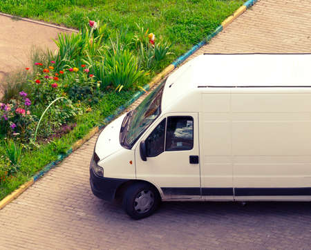 unloading delivery van (subjects there is global altered)の写真素材