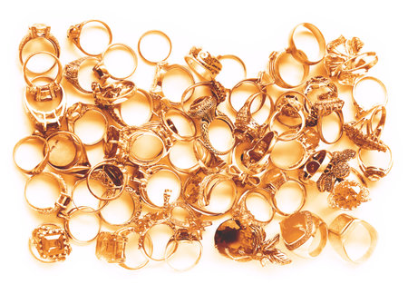 golden finger rings on white