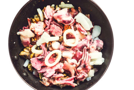 semifinished assorty seafood in wokの写真素材