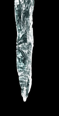 big icicle ;solated in blackの写真素材