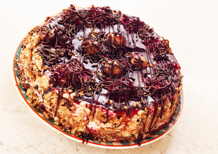 the tart cream-nut, chocolate and cherry syrup topping