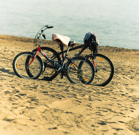 Russia, 2019: russian manufactured bicycles Stels stands on the beachのeditorial素材