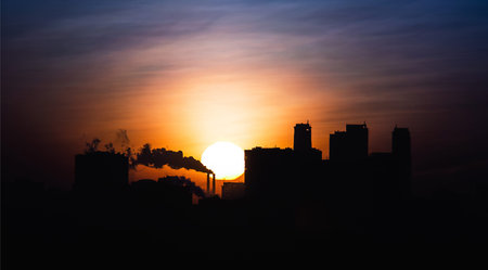 urban horizon at fiery sunrise