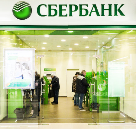 Russia, 2020: people are served in the self-service section of the federal bank Sberbankのeditorial素材