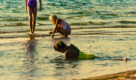 child girls on sea beachのeditorial素材