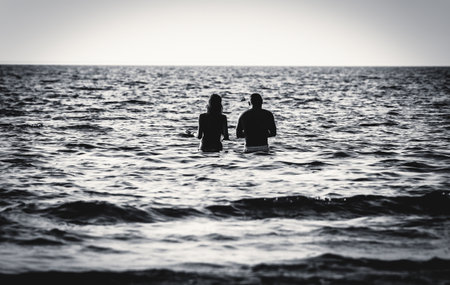 couple in the sea waterの写真素材