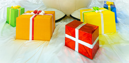 colorful gift boxes on stilized snow