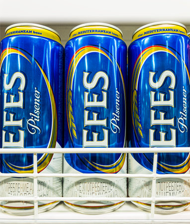 Russia 2021: Efes Pilsener beer in tin cans standing in supermarket shelfのeditorial素材