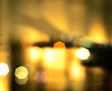 defocused hand in golden bokeh