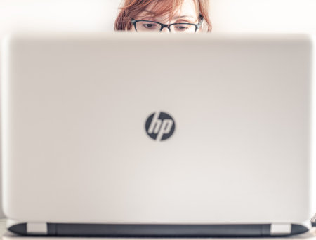 Moscow, Russia - August 05, 2018: unrecognizable woman working on the laptop HP Pavilion 17のeditorial素材