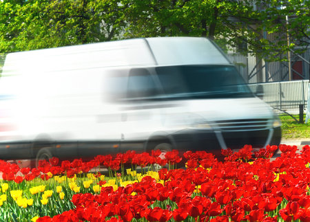 city delivery minivan in motion
