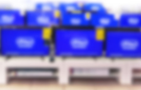 TVs in electronic store, defocused