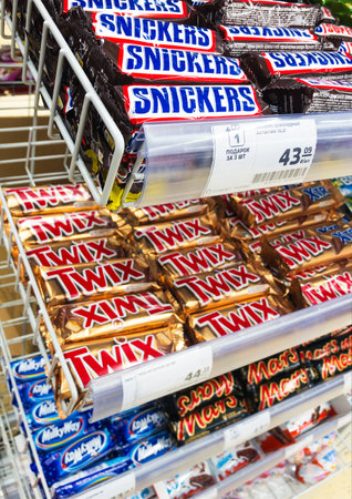 Russia 2021: Mars chocolate production assortment on supermarket rackのeditorial素材