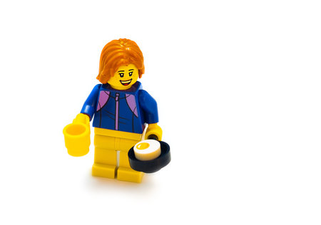 2021: Lego constructor character holds an omelet with mugのeditorial素材