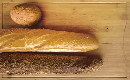 white and black breads on breadboard