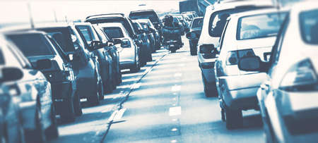 jammed suburban highway traffic at blue hourの写真素材